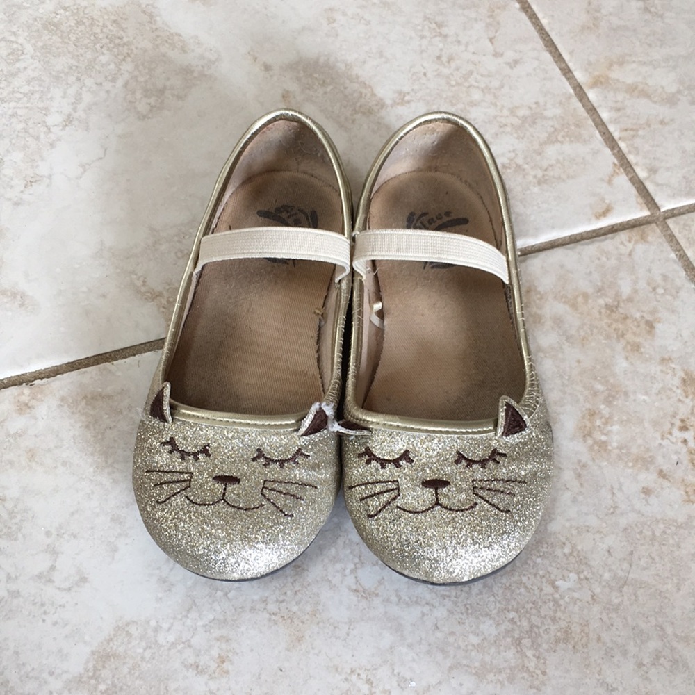 Children place shoes